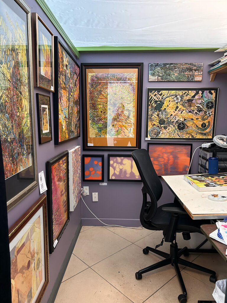 Artist studio covered in artwork